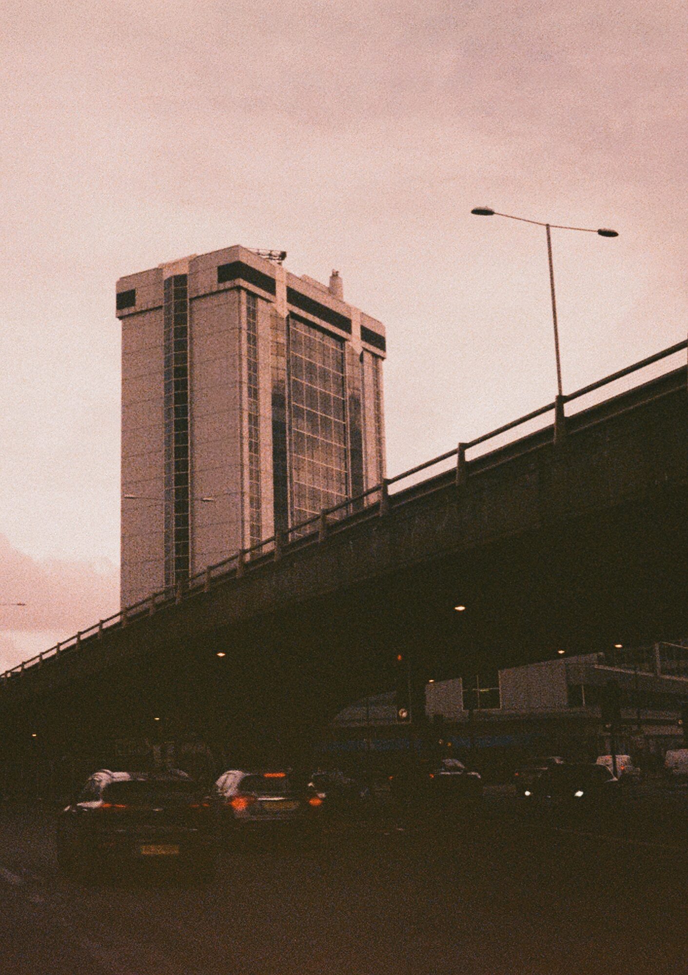2026-02-09 / 0054 — Paddington — shot on Olympus Pen EES-2 — Lomography X Tungsten 64