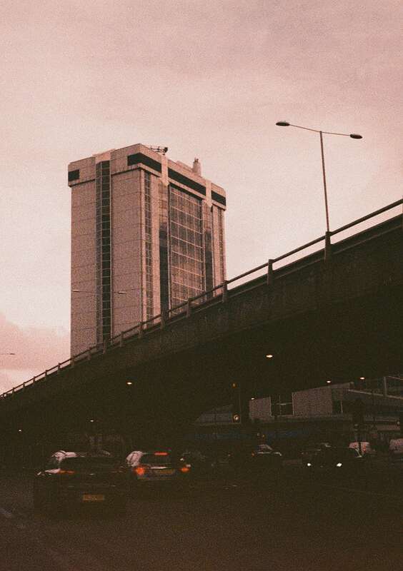 2026-02-09 / 0054 — Paddington — shot on Olympus Pen EES-2 — Lomography X Tungsten 64